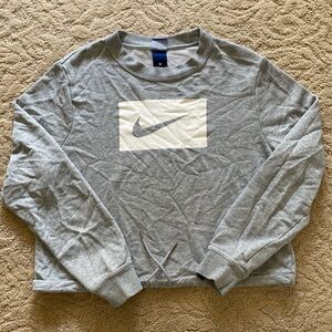 Gray and white cropped Nike crewneck sweatshirt with drawstring waist